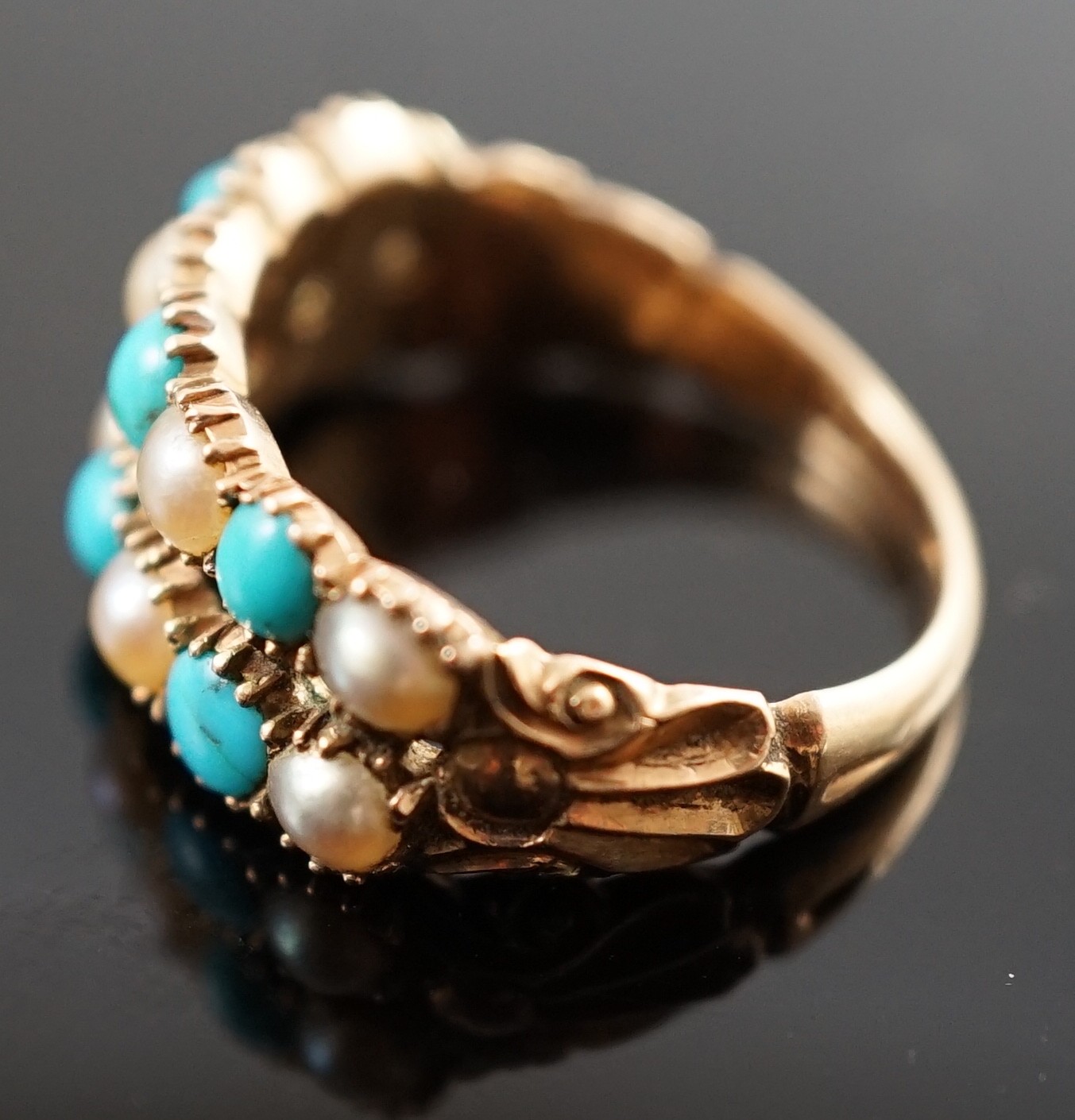 A Victorian gold two row turquoise and split pearl set half hoop ring